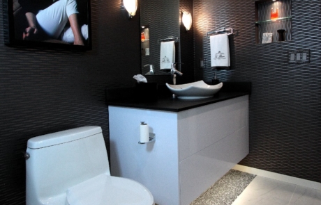 Bathroom Remodeling, white contemporary vanity with vessel sink, quartz countertops, sconce lights, large walk-in shower, kohler fixtures, tile floor