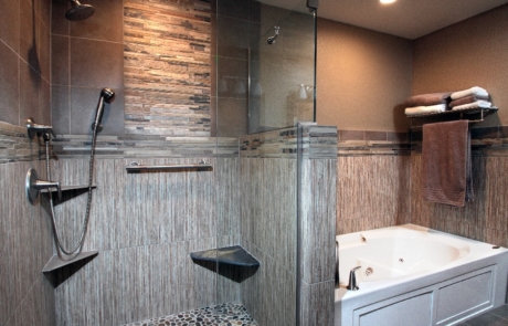 Bathroom Remodeling, large walk-in shower and whirlpool tub, natural stone accent, shower bench